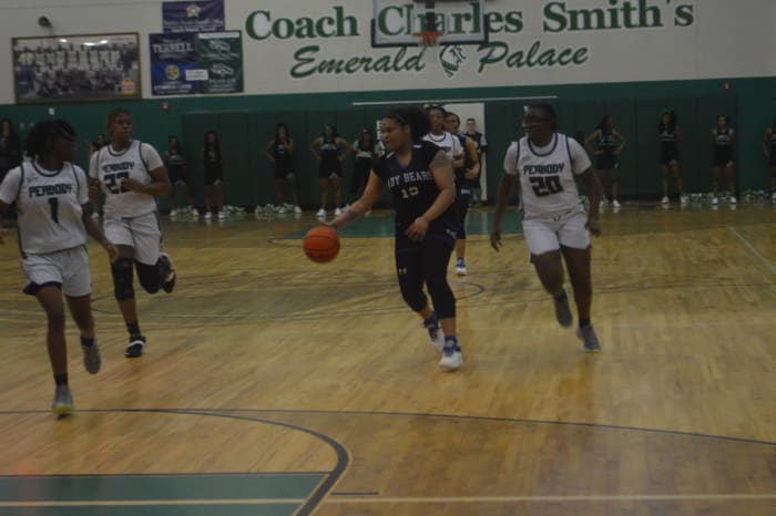 Bolton senior Sky Montgomery (13) dribbles down the floor during the Lady Bears' loss to Peabody on Thursday.